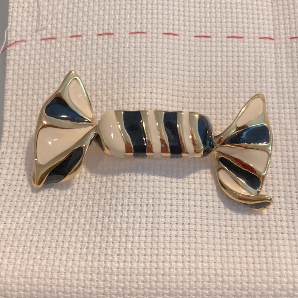 Signed Vintage St John “candy wrapper” pin. Excellent condition